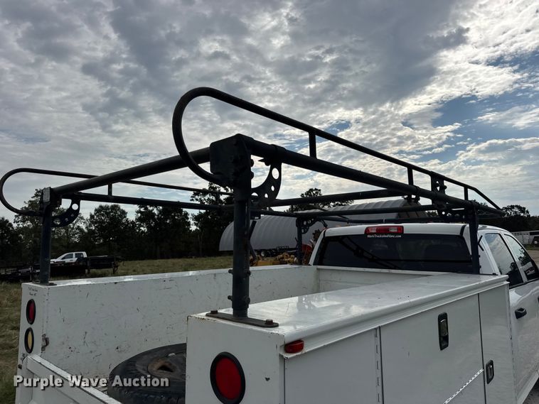 image for item EN0563 2016 RAM 2500 Crew Cab utility bed pickup truck