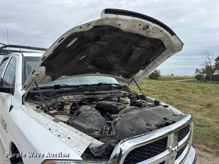 image for item EN0563 2016 RAM 2500 Crew Cab utility bed pickup truck