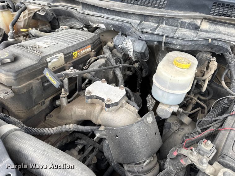 image for item EN0563 2016 RAM 2500 Crew Cab utility bed pickup truck