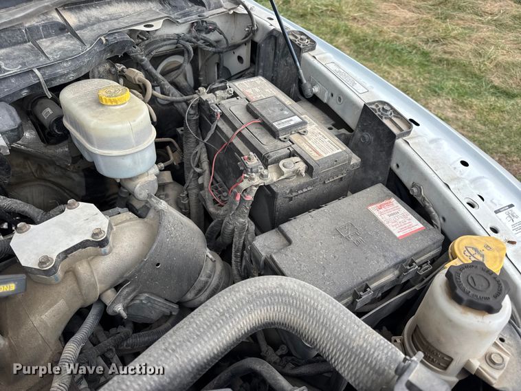 image for item EN0563 2016 RAM 2500 Crew Cab utility bed pickup truck