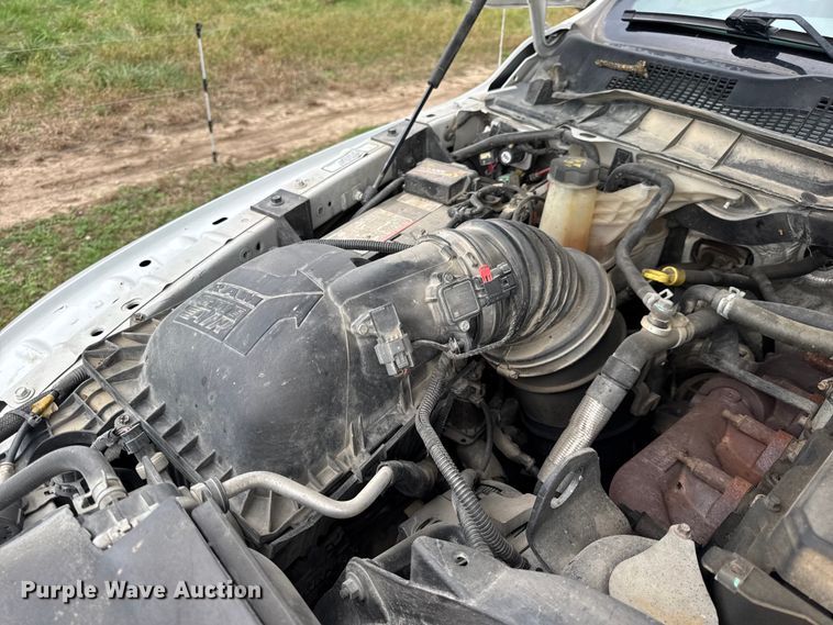 image for item EN0563 2016 RAM 2500 Crew Cab utility bed pickup truck