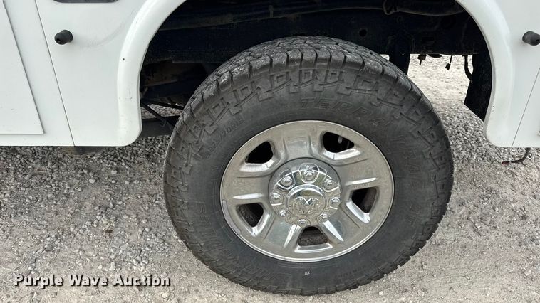 image for item EN0563 2016 RAM 2500 Crew Cab utility bed pickup truck