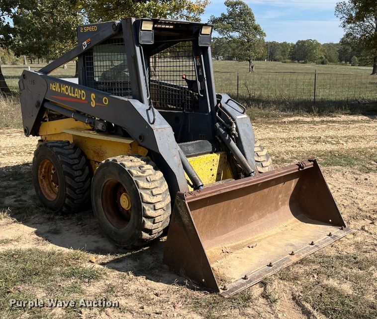 MINI CARGADOR SOBRE RUEDAS 2000 NEW HOLLAND LS180