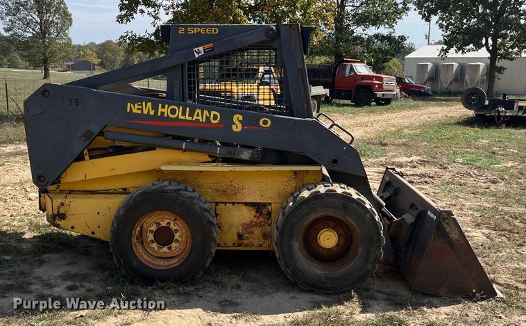 MINI CARGADOR SOBRE RUEDAS 2000 NEW HOLLAND LS180