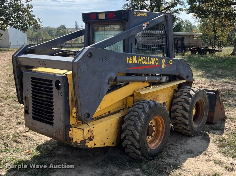 MINI CARGADOR SOBRE RUEDAS 2000 NEW HOLLAND LS180