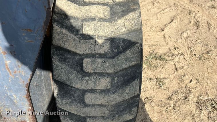 image for item EN5713 2000 New Holland LS180 skid steer loader