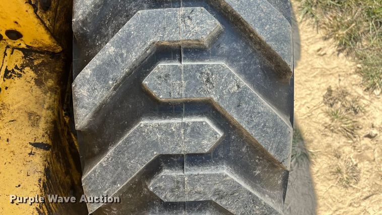 image for item EN5713 2000 New Holland LS180 skid steer loader