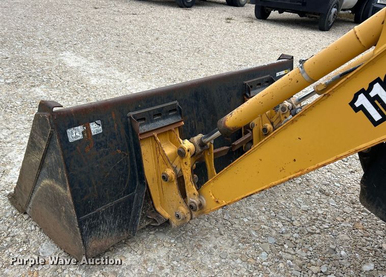 image for item ET3338 2004 John Deere 110 backhoe