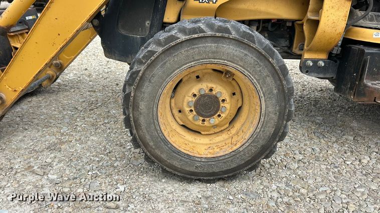 image for item ET3338 2004 John Deere 110 backhoe