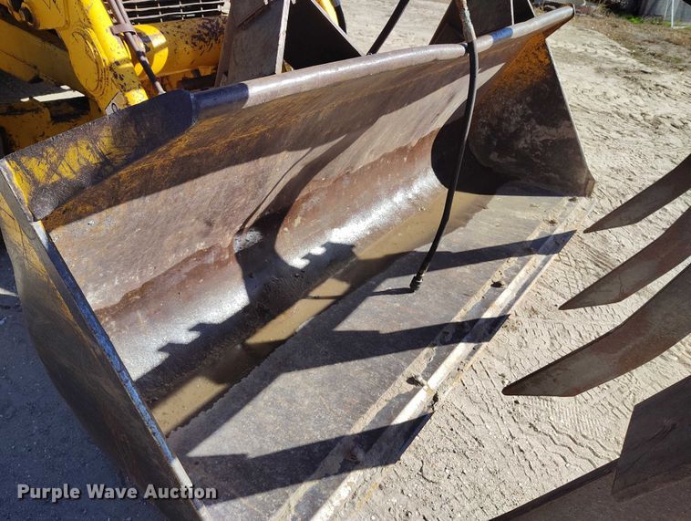 image for item IP9735 1983 John Deere 510B Turbo backhoe