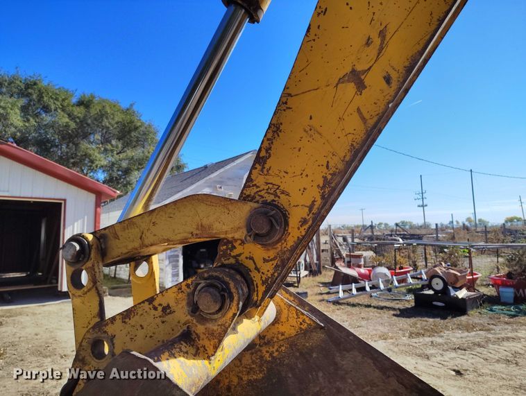 image for item IP9735 1983 John Deere 510B Turbo backhoe