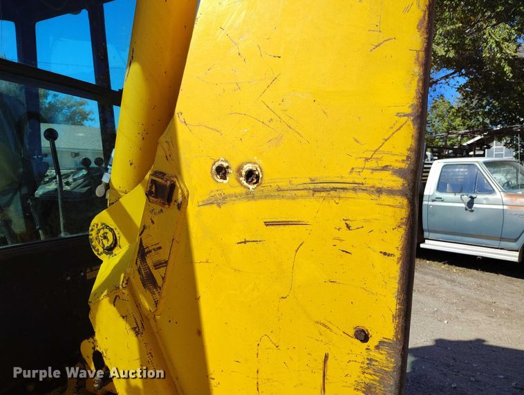 image for item IP9735 1983 John Deere 510B Turbo backhoe