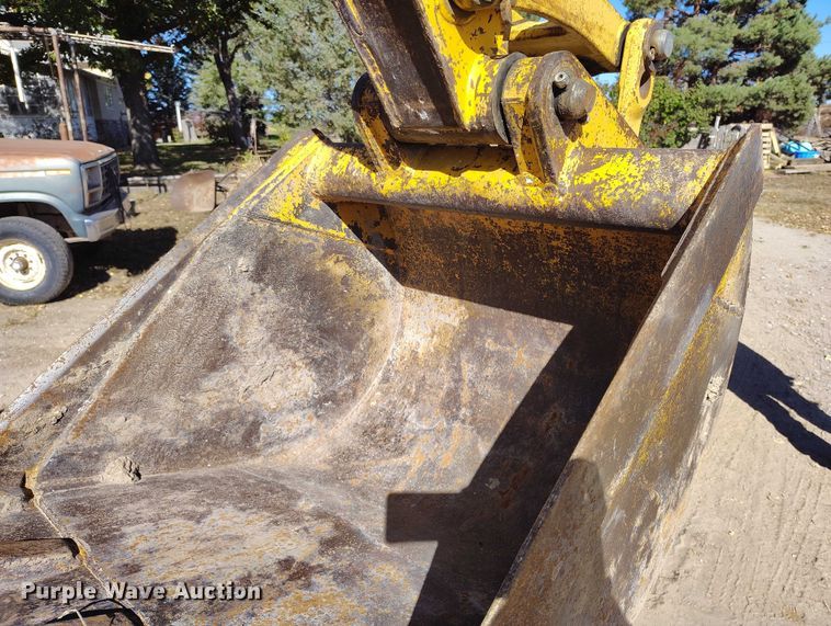 image for item IP9735 1983 John Deere 510B Turbo backhoe