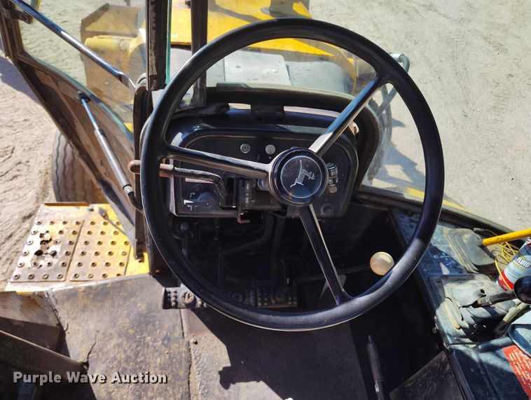 image for item IP9735 1983 John Deere 510B Turbo backhoe