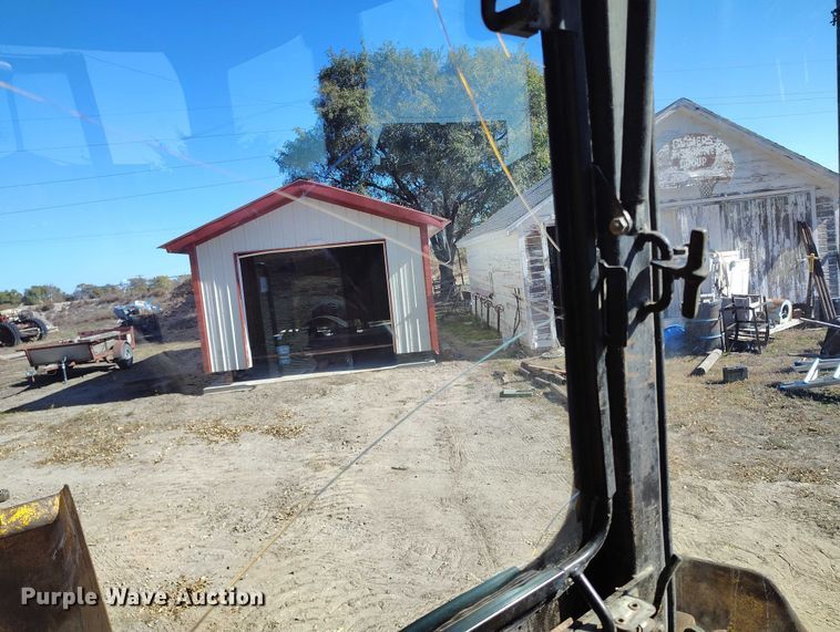 image for item IP9735 1983 John Deere 510B Turbo backhoe