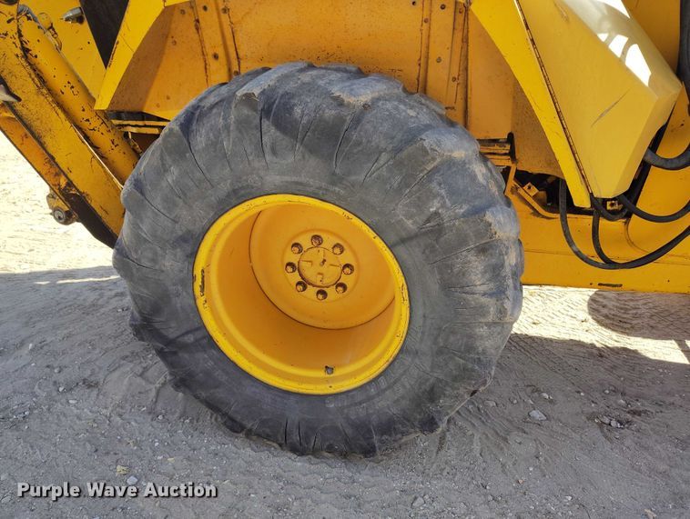 image for item IP9735 1983 John Deere 510B Turbo backhoe