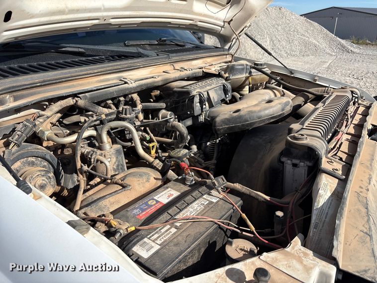 image for item EA7777 2006 Ford F350 Super Duty Ext. Cab flatbed pickup truck