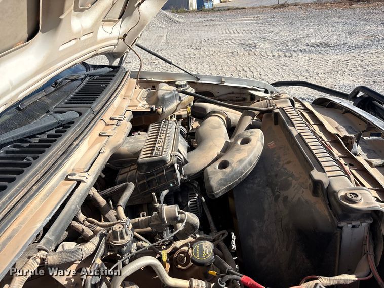 image for item EA7777 2006 Ford F350 Super Duty Ext. Cab flatbed pickup truck