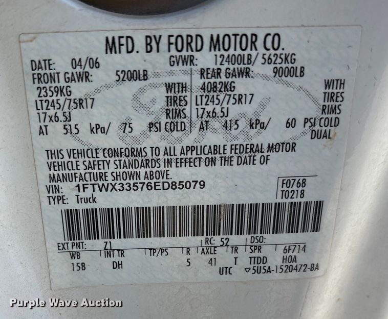 image for item EA7777 2006 Ford F350 Super Duty Ext. Cab flatbed pickup truck