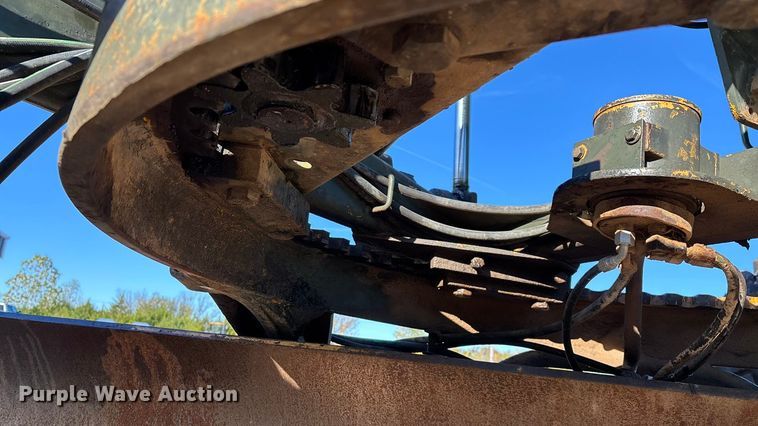 image for item ED2328 1990 John Deere 570B motor grader