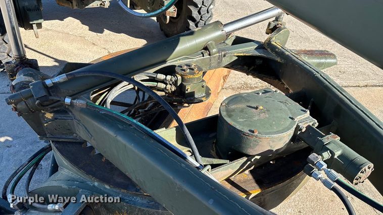 image for item ED2328 1990 John Deere 570B motor grader