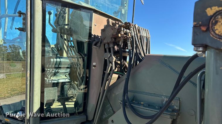 image for item ED2328 1990 John Deere 570B motor grader