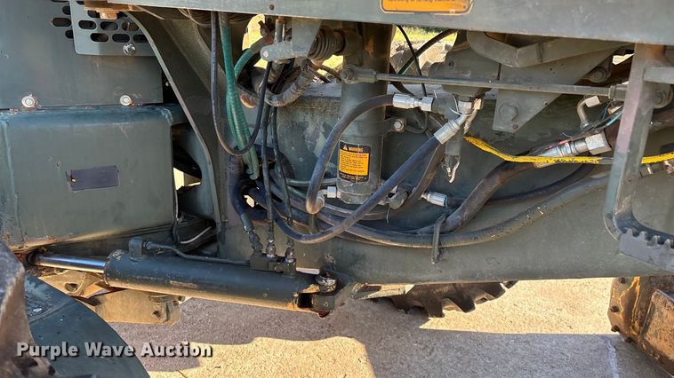 image for item ED2328 1990 John Deere 570B motor grader