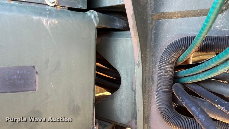 image for item ED2328 1990 John Deere 570B motor grader