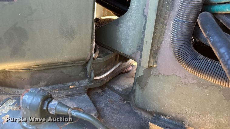 image for item ED2328 1990 John Deere 570B motor grader