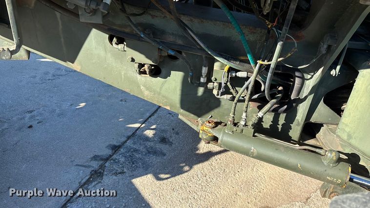 image for item ED2328 1990 John Deere 570B motor grader