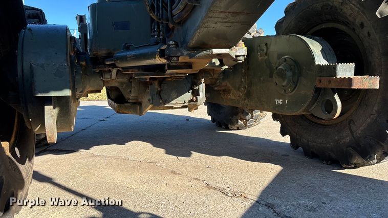 image for item ED2328 1990 John Deere 570B motor grader