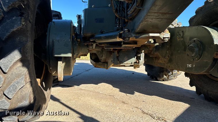 image for item ED2328 1990 John Deere 570B motor grader