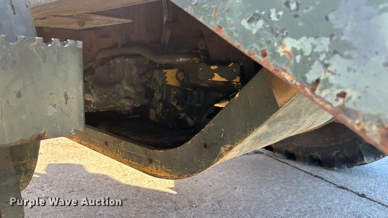 image for item ED2328 1990 John Deere 570B motor grader