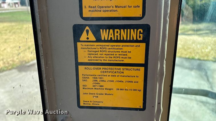 image for item ED2328 1990 John Deere 570B motor grader