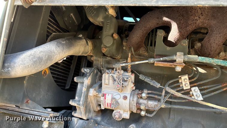 image for item ED2328 1990 John Deere 570B motor grader