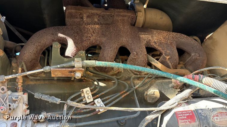 image for item ED2328 1990 John Deere 570B motor grader