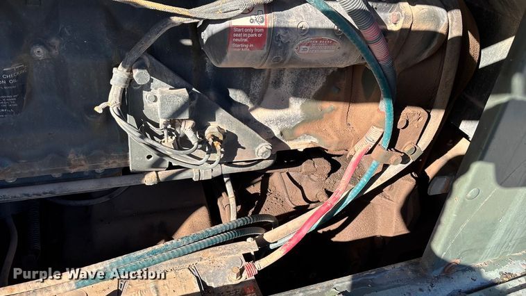 image for item ED2328 1990 John Deere 570B motor grader