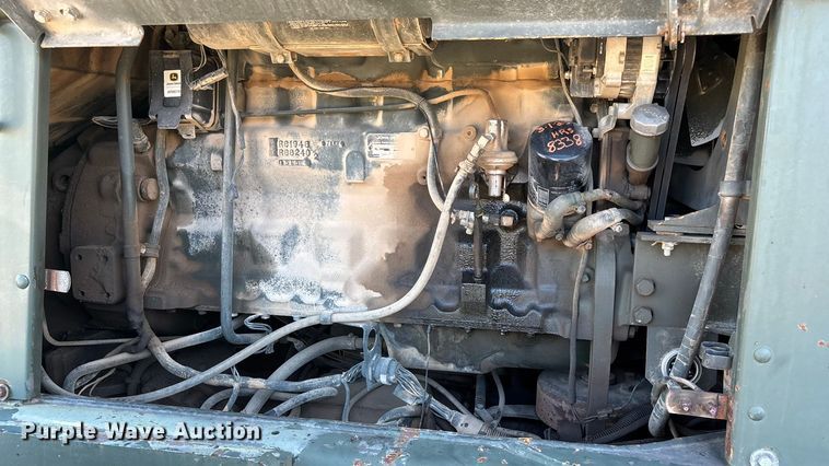 image for item ED2328 1990 John Deere 570B motor grader