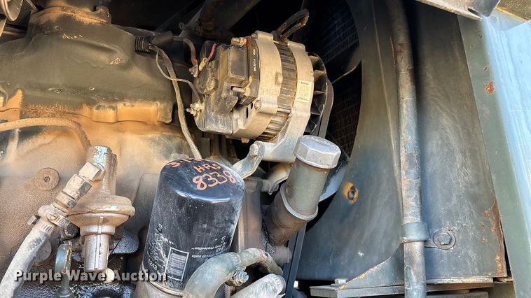 image for item ED2328 1990 John Deere 570B motor grader