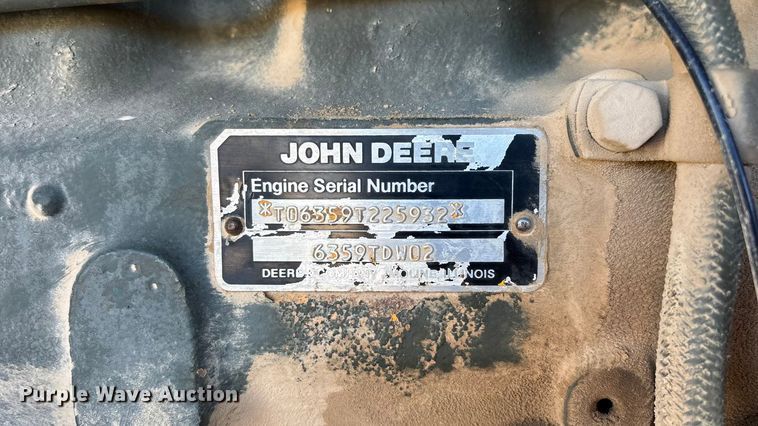 image for item ED2328 1990 John Deere 570B motor grader