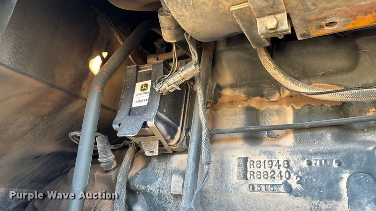 image for item ED2328 1990 John Deere 570B motor grader