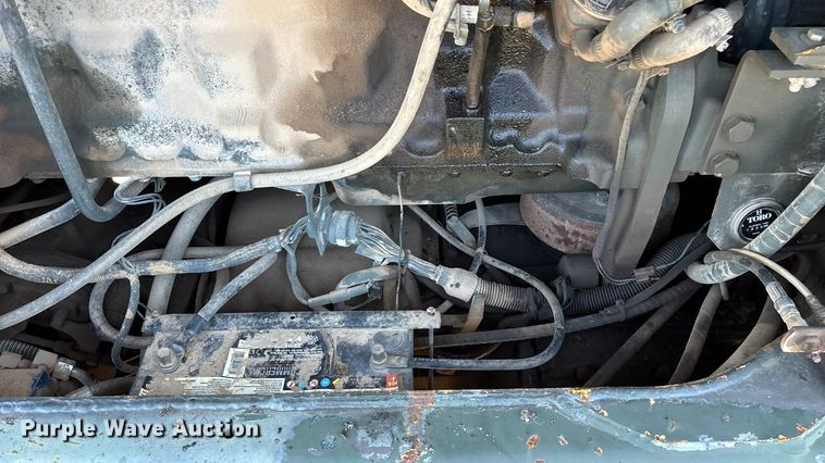 image for item ED2328 1990 John Deere 570B motor grader