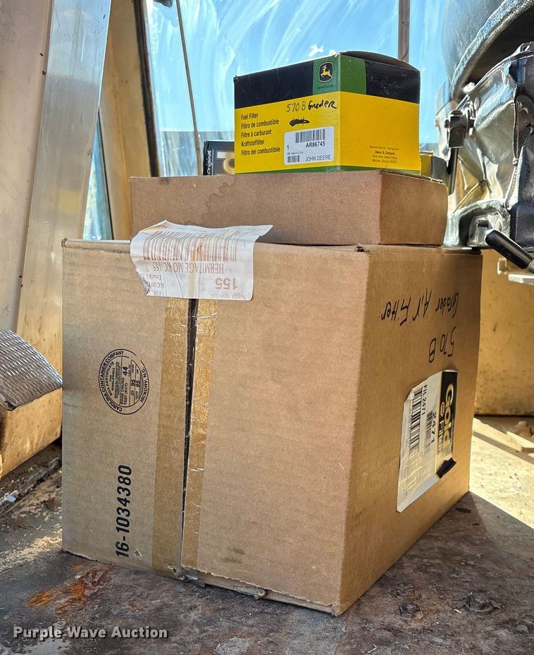 image for item ED2328 1990 John Deere 570B motor grader