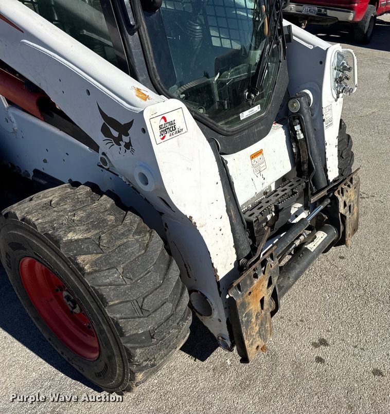 image for item EN0665 2014 Bobcat S750 skid steer loader