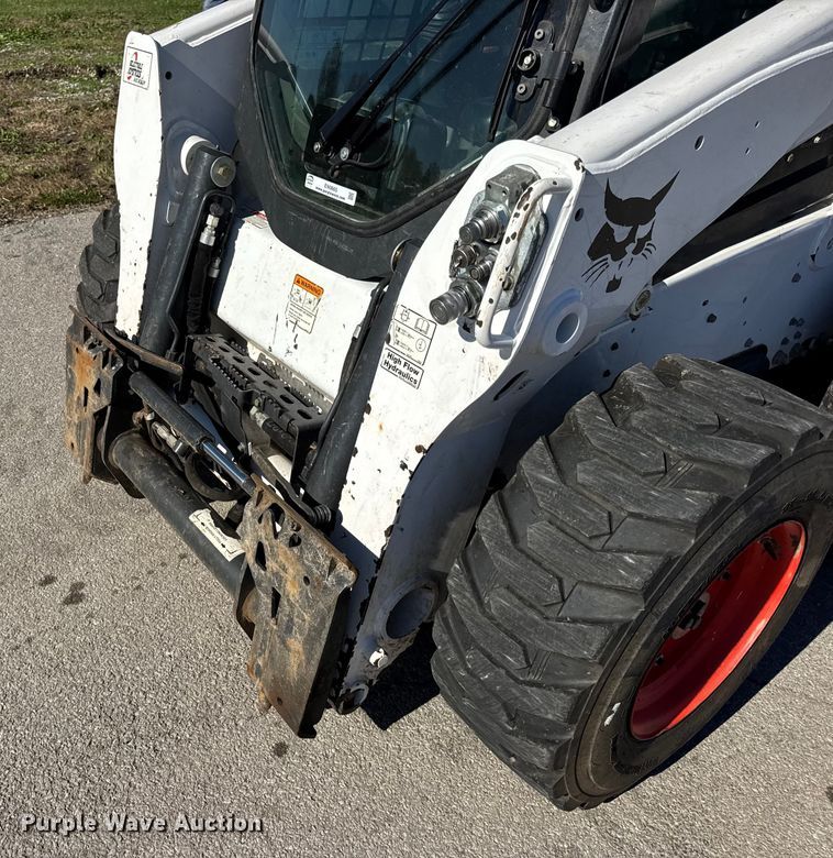 image for item EN0665 2014 Bobcat S750 skid steer loader