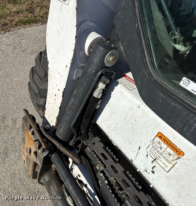 image for item EN0665 2014 Bobcat S750 skid steer loader