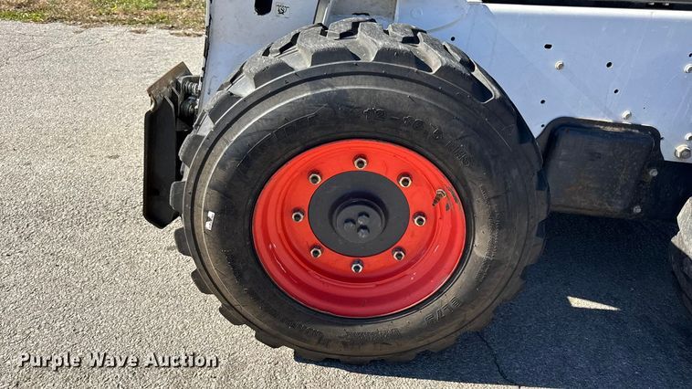 image for item EN0665 2014 Bobcat S750 skid steer loader