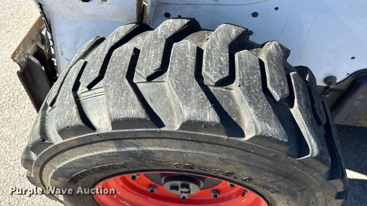 image for item EN0665 2014 Bobcat S750 skid steer loader