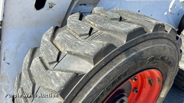 image for item EN0665 2014 Bobcat S750 skid steer loader