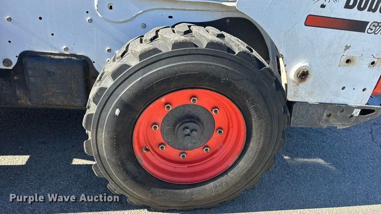 image for item EN0665 2014 Bobcat S750 skid steer loader